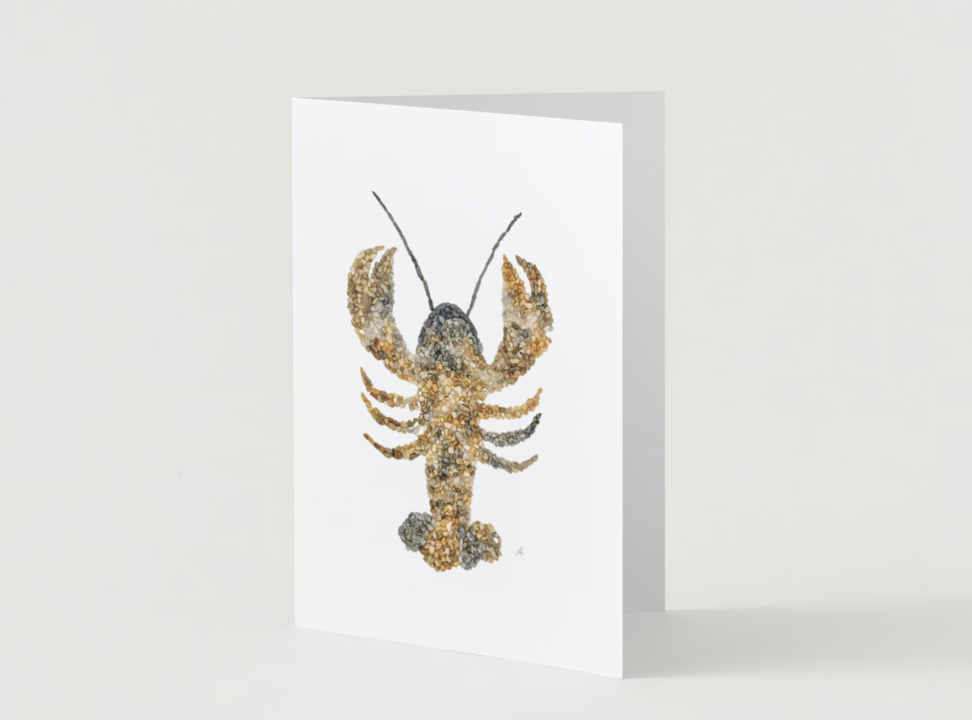 Image of a 5x7 Mosaic Pebble Art Lobster Print Card featuring coastal-inspired artwork created from original art pieces. Includes an envelope. A handcrafted Maine Made product perfect for any occasion.