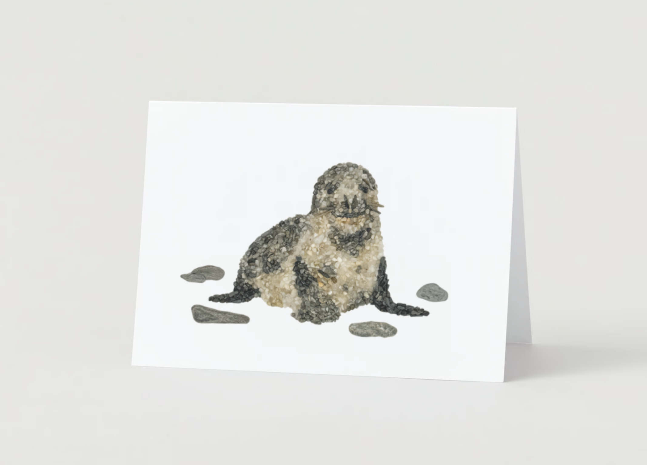 Image of a 5x7 Mosaic Pebble Art Seal Print Card featuring coastal-inspired artwork created from original art pieces. Includes an envelope. A handcrafted Maine Made product perfect for any occasion.